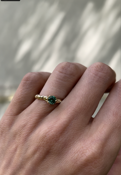 14 k yellow gold ring with tourmaline "SAND PLAY ETERNITY"